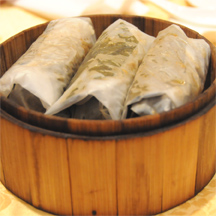 Sticky rice in a meat wrap with lotus leaf