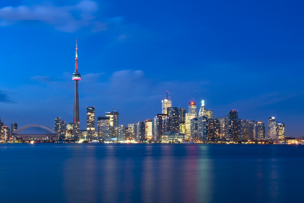 photo of the Toronto skyline at night where new study shows city has work-life balance issues