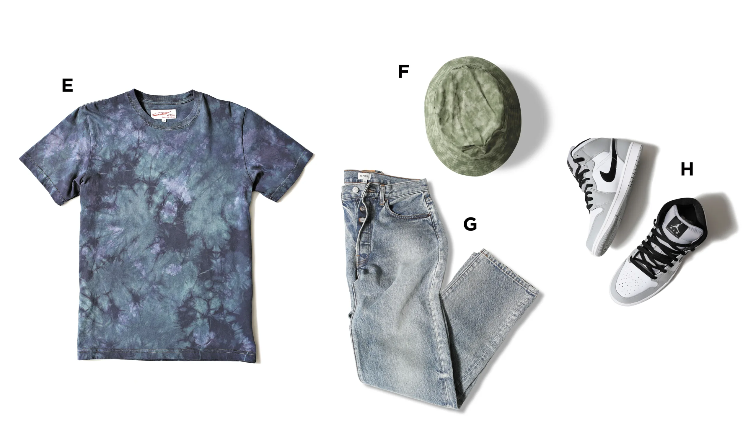 Dad in the city style includes a blue and green tie-dye T-shirt, light wash jeans, a green bucket hat and grey and white high top Jordans