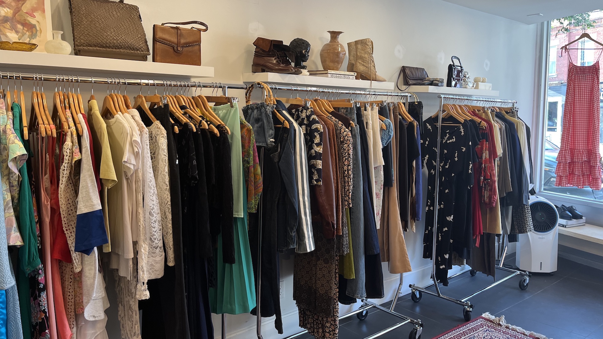 A clothing rack of vintage clothes