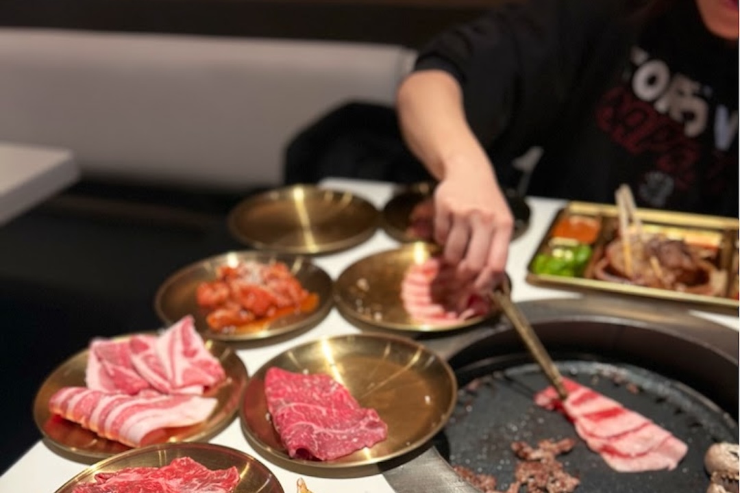 All-you-can-eat Korean barbecue grill with pork belly and marinated beef at Jongro on Yonge Street.